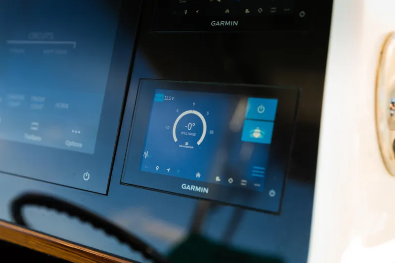 Toto II Yacht Photos Pics Garmin display on 2019 Mag Bay 33 CC boat showing roll angle and voltage.