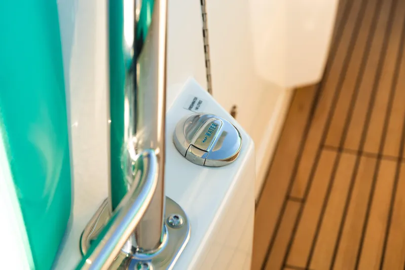 Toto II Yacht Photos Pics Close-up of 2019 Mag Bay 33 CC boat deck with water fill cap.