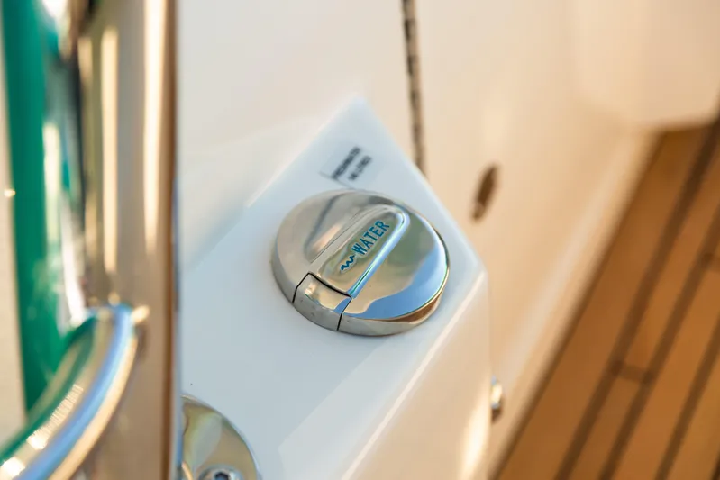 Toto II Yacht Photos Pics Water fill cap on 2019 Mag Bay 33 CC boat deck.