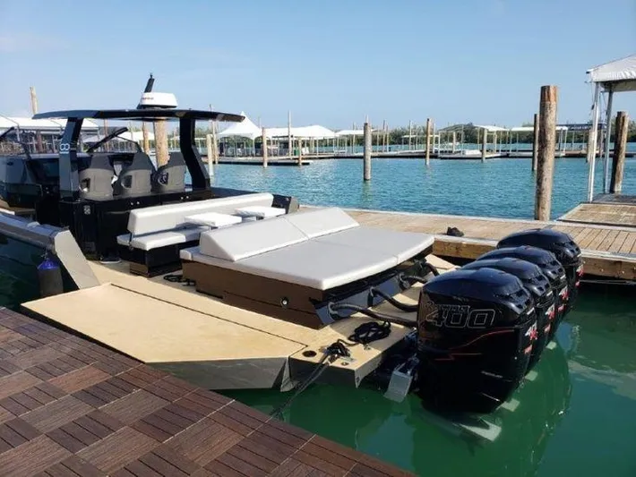 Seafinity Yacht Photos Pics 2019 Seanfinity TS48 boat docked with powerful outboard engines.