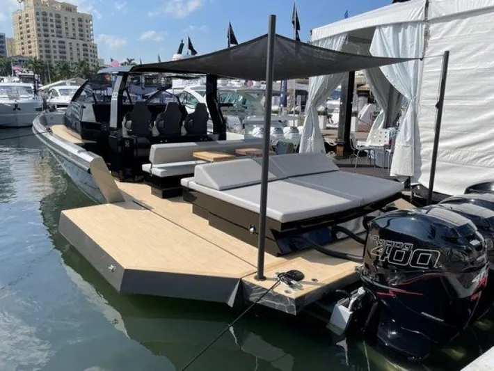 Seafinity Yacht Photos Pics Seanfinity TS48 2019 luxury yacht with sunshade, docked at marina.