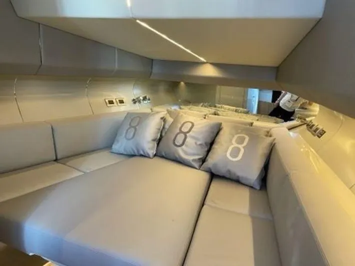 Seafinity Yacht Photos Pics Luxurious interior of 2019 Seanfinity TS48 yacht with plush seating and decorative pillows.