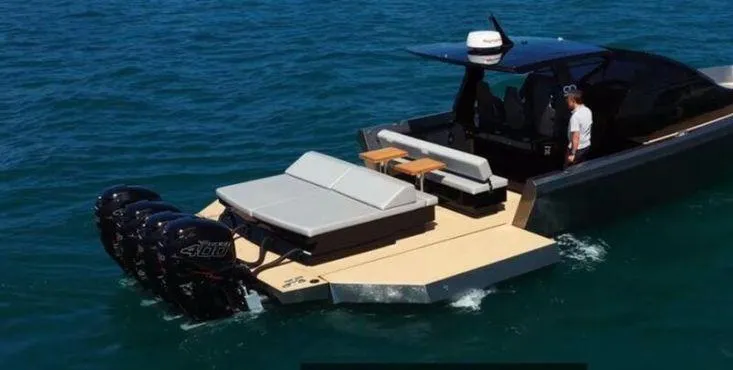 Seafinity Yacht Photos Pics Seanfinity TS48 2019 luxury boat on water with multiple outboard engines.