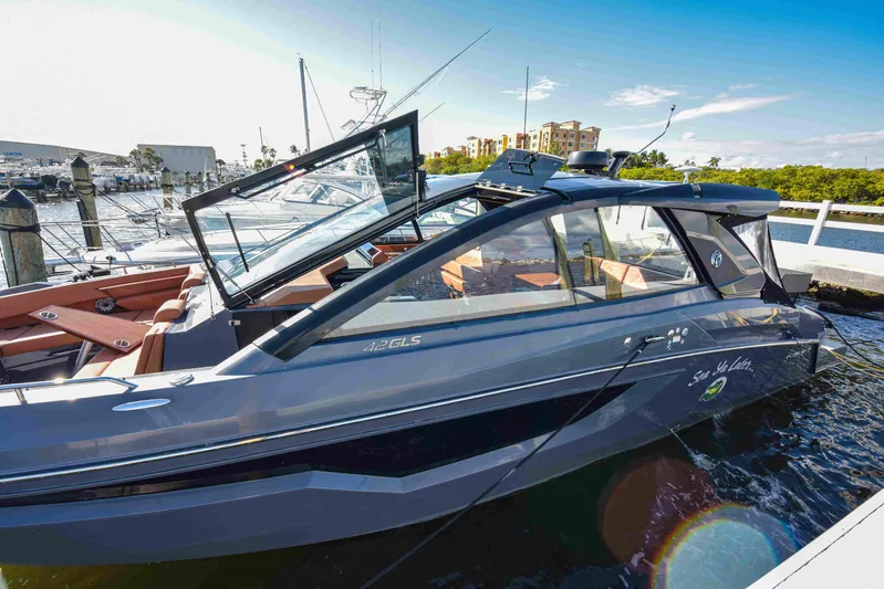 Sea Ya Later Yacht Photos Pics 2021 Cruisers Yachts 42 GLS OB docked, showcasing sleek design and modern features.
