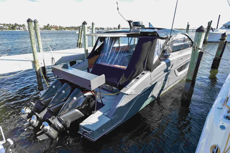 Sea Ya Later Yacht Photos Pics 2021 Cruisers Yachts 42 GLS OB docked, featuring sleek design and powerful outboard engines.