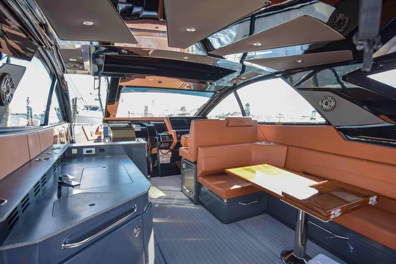 Sea Ya Later Yacht Photos Pics Interior of 2021 Cruisers Yachts 42 GLS OB, featuring luxurious seating and modern amenities.