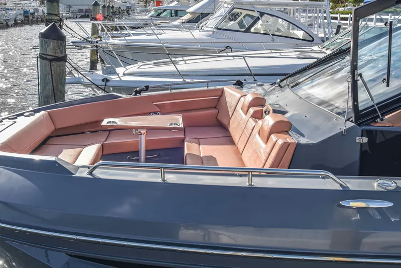 Sea Ya Later Yacht Photos Pics 2021 Cruisers Yachts 42 GLS OB with spacious seating at a marina.