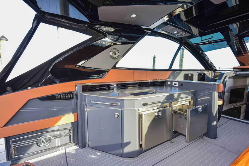 Sea Ya Later Yacht Photos Pics 2021 Cruisers Yachts 42 GLS OB interior with sleek kitchen and modern design elements.