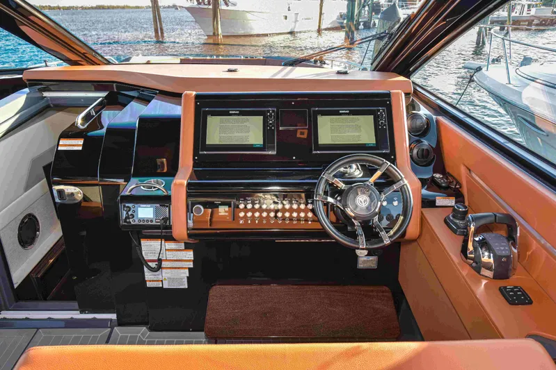 Sea Ya Later Yacht Photos Pics 2021 Cruisers Yachts 42 GLS OB helm with dual screens and modern controls.