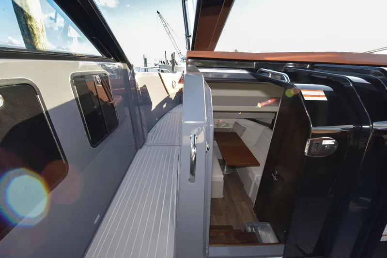 Sea Ya Later Yacht Photos Pics 2021 Cruisers Yachts 42 GLS OB cabin entrance with sleek design and modern interior.