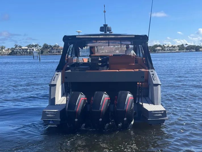 Sea Ya Later Yacht Photos Pics 2021 Cruisers Yachts 42 GLS OB with triple outboard engines on the water.