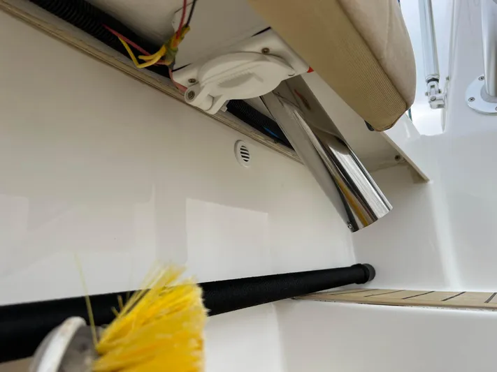  Yacht Photos Pics 2021 Henriques 42 Express Hardtop Bridge interior detail with wiring and cleaning brush.