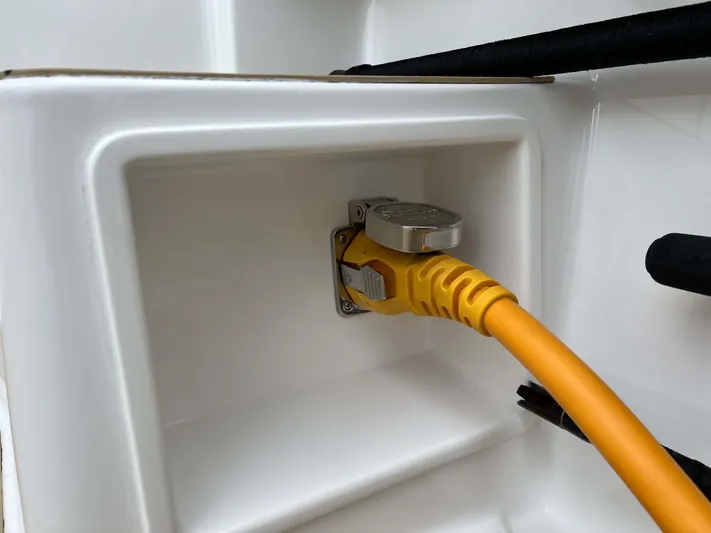  Yacht Photos Pics Yellow power cable connected to a 2021 Henriques 42 Express Hardtop Bridge.