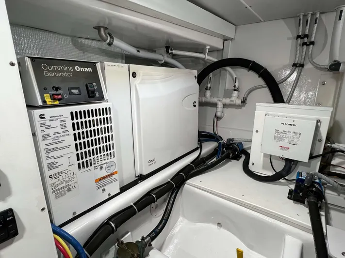  Yacht Photos Pics Engine room of 2021 Henriques 42 Express with Cummins Onan generator.