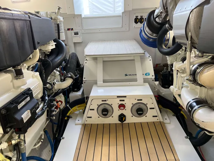  Yacht Photos Pics Engine room of 2021 Henriques 42 Express Hardtop Bridge, showcasing modern machinery and controls.
