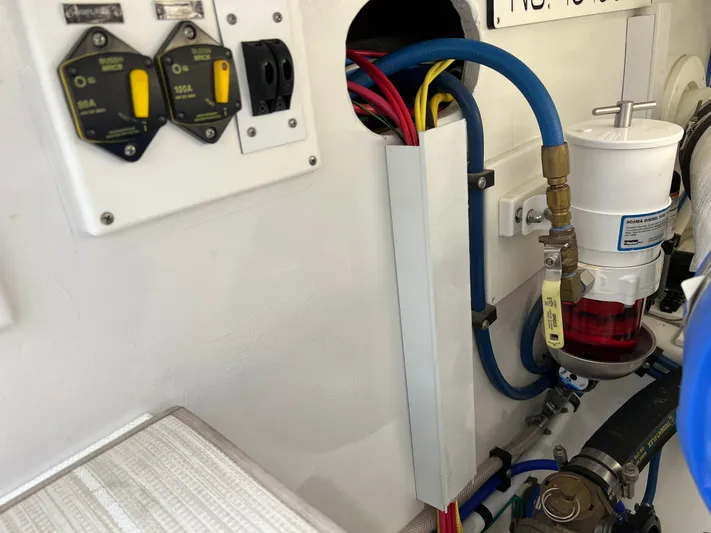  Yacht Photos Pics Engine room wiring and fuel filter system in 2021 Henriques 42 Express Hardtop Bridge.