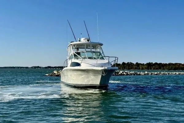 Seanior Moment Yacht Photos Pics 2022 Stamas 370 Aegean boat cruising on a clear blue sea.