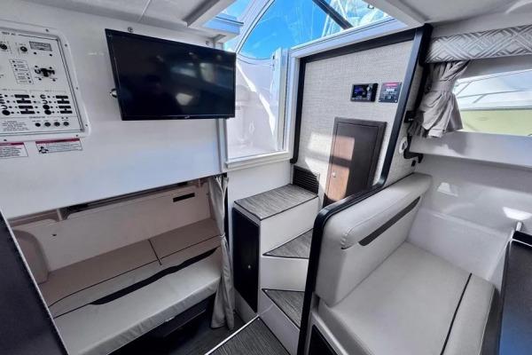 Interior of 2022 Stamas 370 Aegean boat with modern seating and entertainment system.
