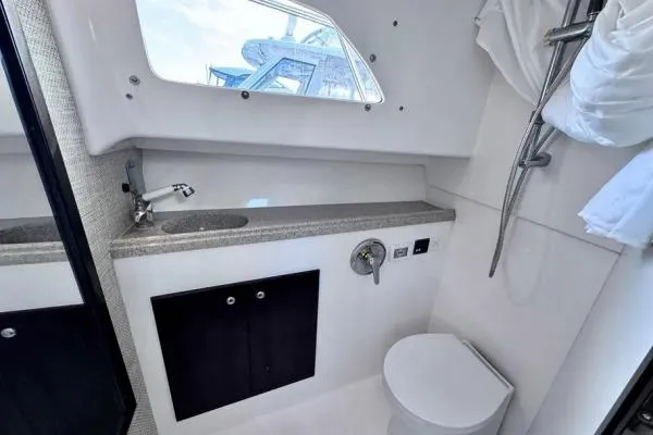 Seanior Moment Yacht Photos Pics Bathroom interior of 2022 Stamas 370 Aegean yacht with modern fixtures.
