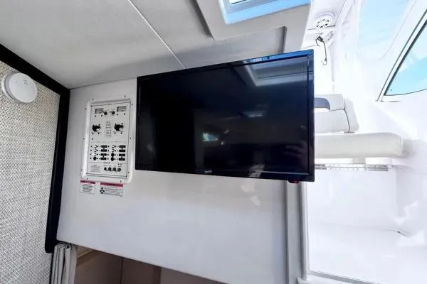 Seanior Moment Yacht Photos Pics 2022 Stamas 370 Aegean interior with control panel and mounted TV.