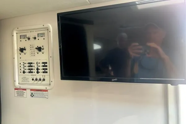 Seanior Moment Yacht Photos Pics 2022 Stamas 370 Aegean interior with control panel and mounted TV.