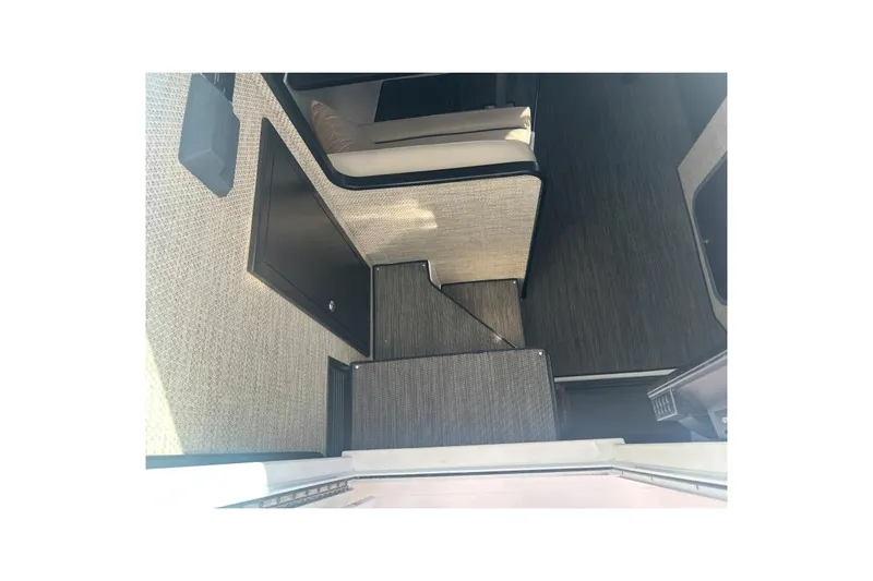 Seanior Moment Yacht Photos Pics Interior view of 2022 Stamas 370 Aegean boat, featuring modern seating and flooring.