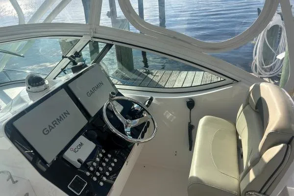 Seanior Moment Yacht Photos Pics 2022 Stamas 370 Aegean boat cockpit with Garmin navigation system and comfortable seating.