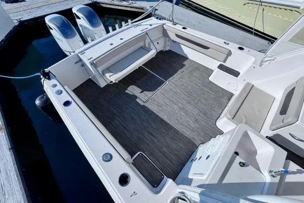 Seanior Moment Yacht Photos Pics 2022 Stamas 370 Aegean boat deck with dual engines and spacious seating area.