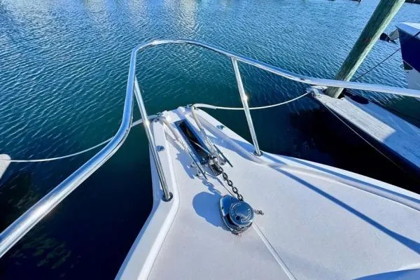 Seanior Moment Yacht Photos Pics Bow of 2022 Stamas 370 Aegean boat with stainless steel railings and anchor chain.