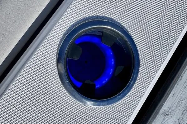 Seanior Moment Yacht Photos Pics Close-up of a 2022 Stamas 370 Aegean boat's blue LED cup holder.