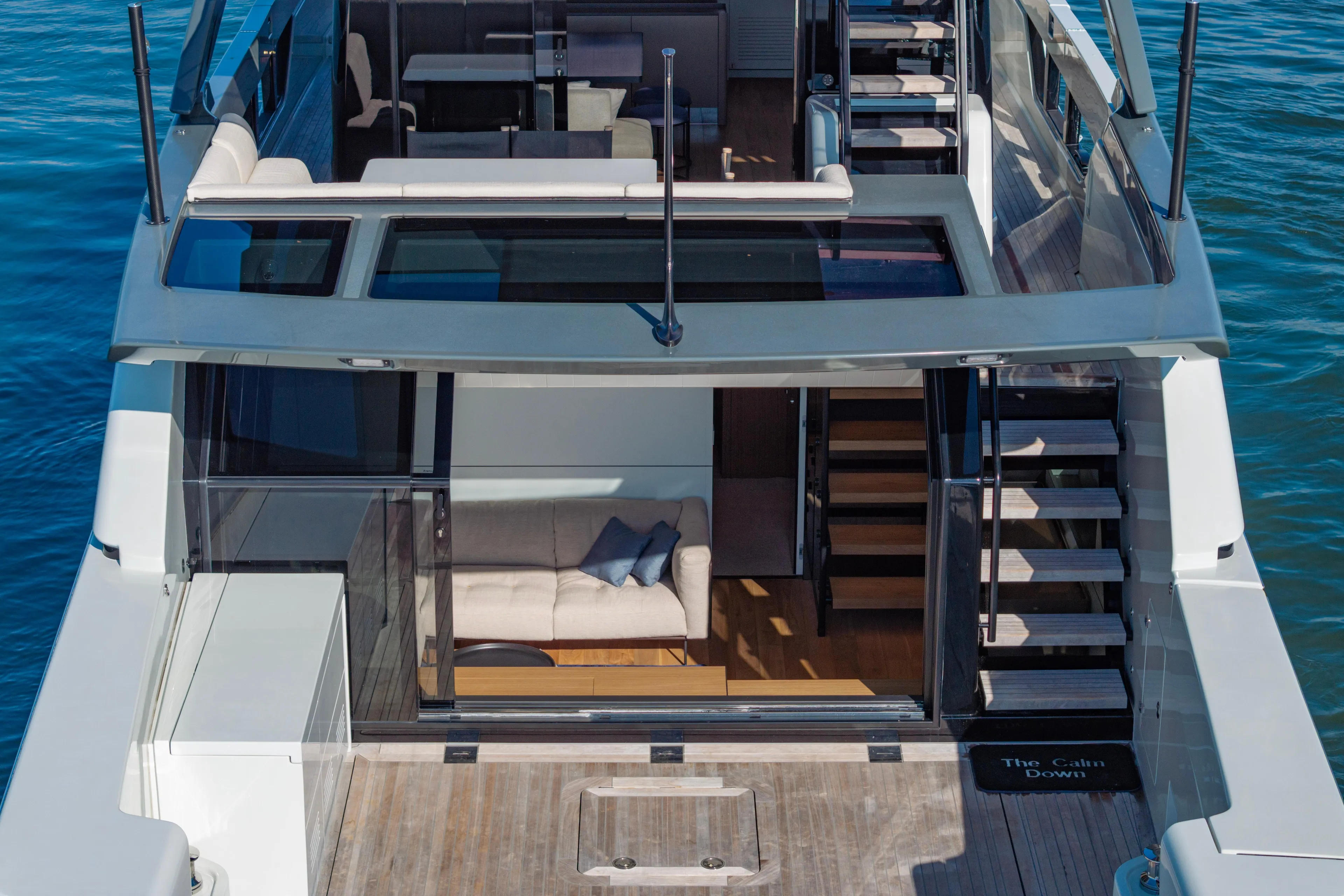 The Calm Down Yacht Photos Pics 2024 Bluegame BGX63 yacht interior with modern design and spacious deck.