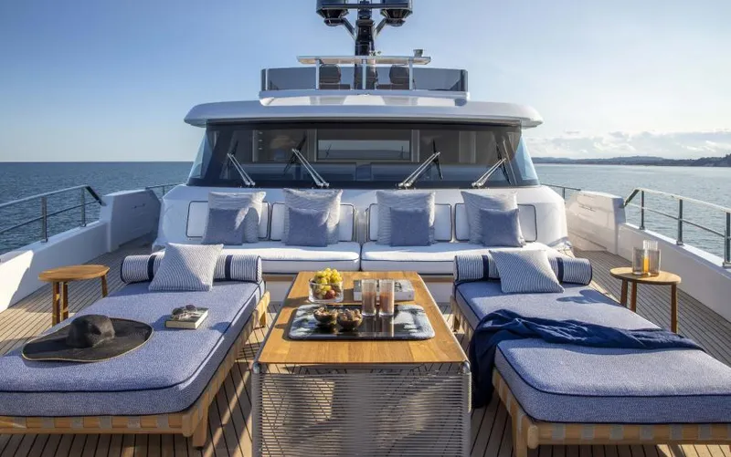  Yacht Photos Pics Luxurious 2024 Custom Line Navetta 30 yacht deck with sun loungers and ocean view.