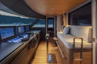 2024 Custom Line Navetta 30 yacht interior with modern navigation equipment and luxurious seating.