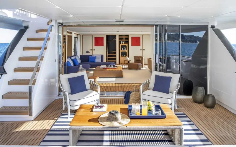  Yacht Photos Pics Luxurious 2024 Custom Line Navetta 30 yacht interior with elegant seating and ocean view.