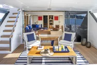 Luxurious 2024 Custom Line Navetta 30 yacht interior with elegant seating and ocean view.