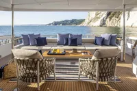 Luxurious 2024 Custom Line Navetta 30 yacht deck with elegant seating and ocean view.