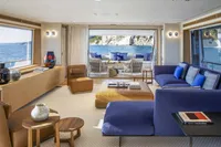 Luxurious interior of 2024 Custom Line Navetta 30 yacht with ocean view and elegant furnishings.