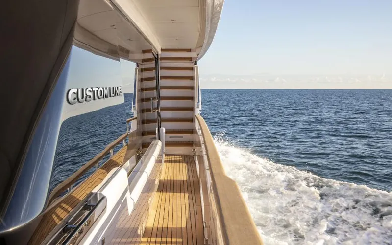  Yacht Photos Pics Luxurious 2024 Custom Line Navetta 30 yacht cruising on open sea.