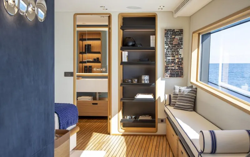  Yacht Photos Pics Luxurious interior of 2024 Custom Line Navetta 30 yacht with elegant furnishings and ocean view.