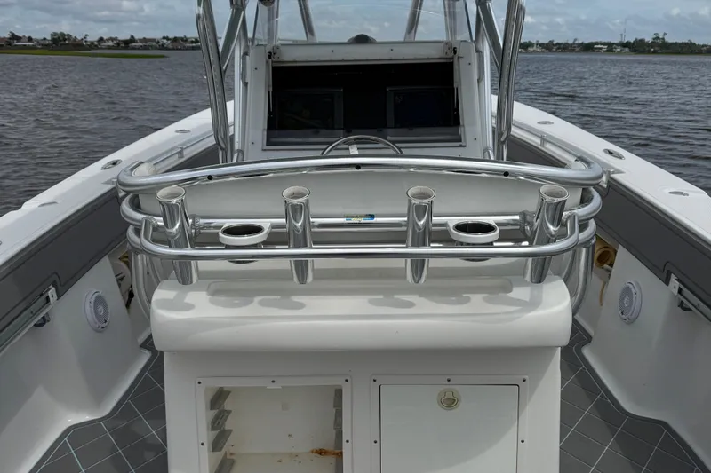 Yacht Photos Pics 2013 SeaHunter 33 Tournament boat with rod holders and open storage on deck.