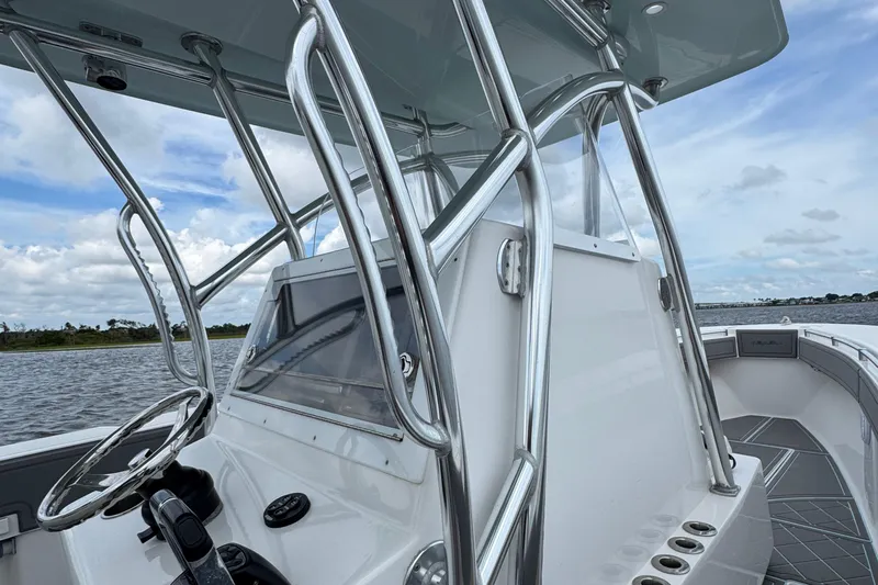  Yacht Photos Pics 2013 SeaHunter 33 Tournament boat with sleek console and stainless steel railings.