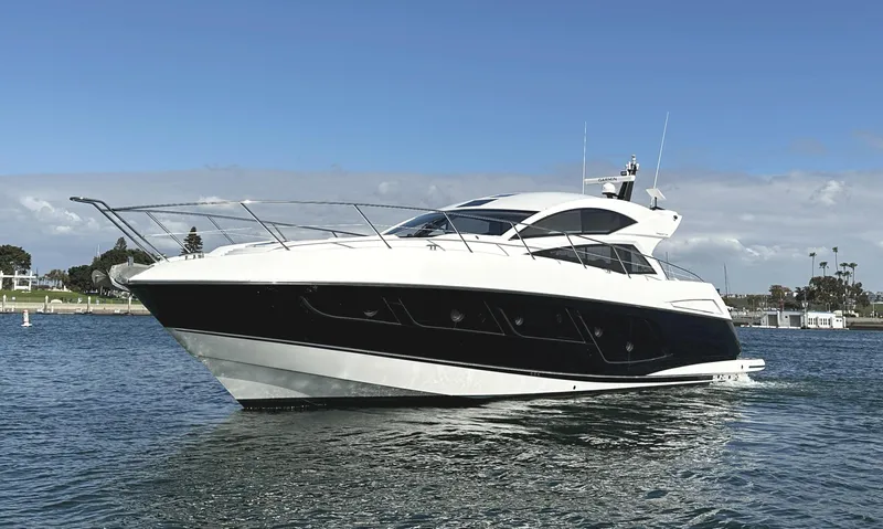 Tucker II Yacht Photos Pics 2015 Sunseeker Predator 57 yacht cruising on open water.