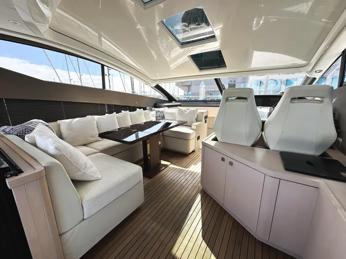 Tucker II Yacht Photos Pics Luxurious interior of 2015 Sunseeker Predator 57 yacht with elegant seating and modern design.