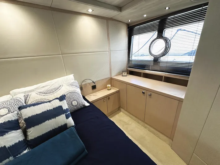 Tucker II Yacht Photos Pics Luxurious cabin interior of 2015 Sunseeker Predator 57 yacht with modern decor.