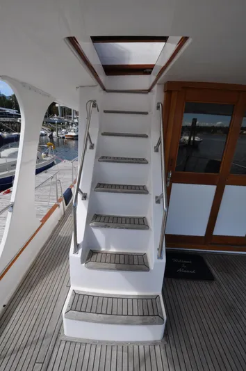  Yacht Photos Pics Staircase on 2000 Grand Banks Heritage Europa 52 yacht, leading to upper deck.