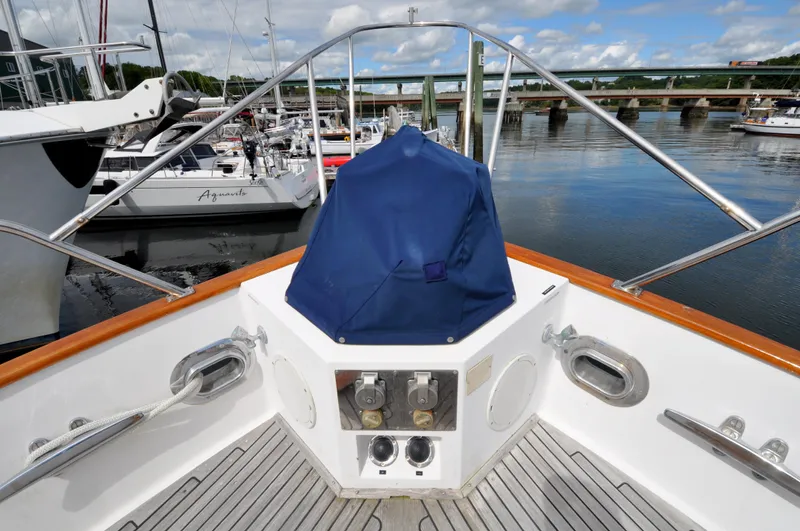  Yacht Photos Pics Bow view of 2000 Grand Banks Heritage Europa 52 yacht at marina.