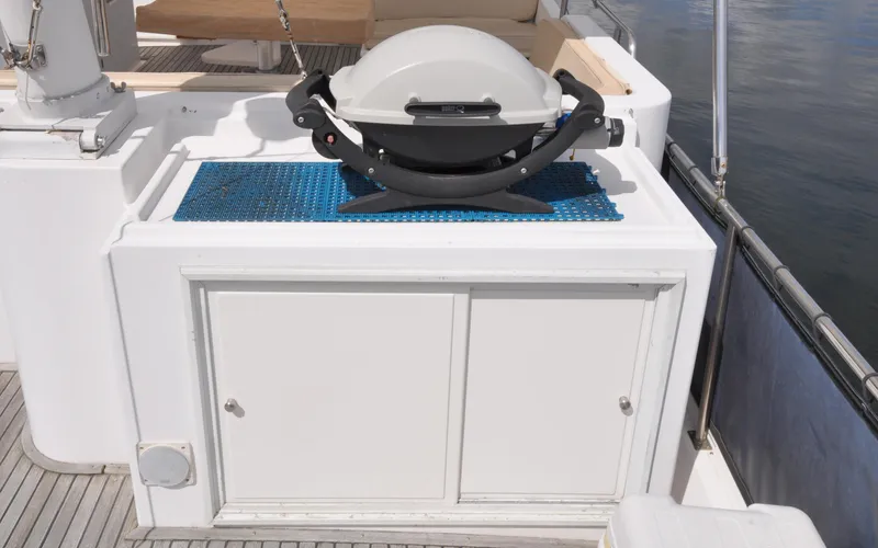  Yacht Photos Pics Outdoor grill on a 2000 Grand Banks Heritage Europa 52 yacht deck.