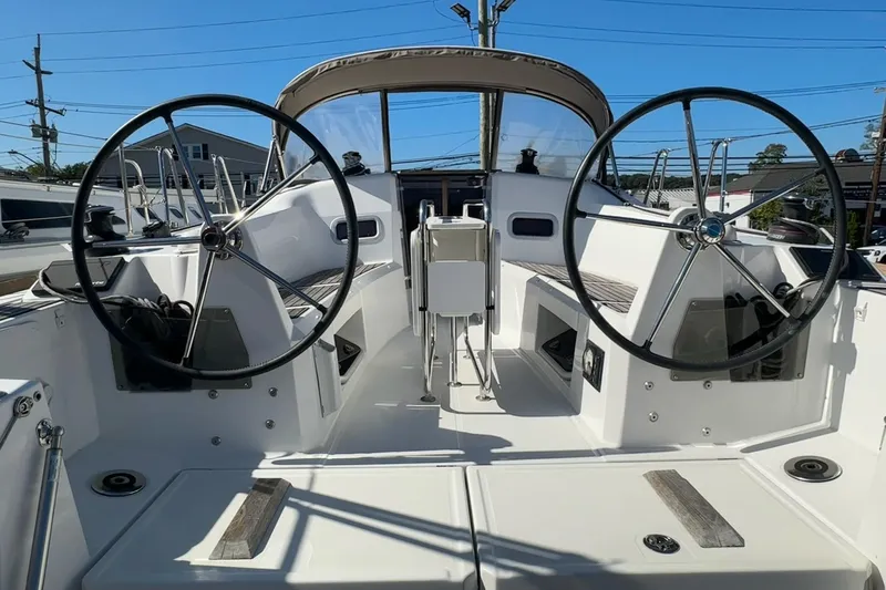  Yacht Photos Pics 2020 Jeanneau Sun Odyssey 349 cockpit with dual steering wheels and modern design.