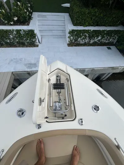 Outnumbered Yacht Photos Pics 2020 Scout 277LXF boat bow with anchor compartment, viewed from above.