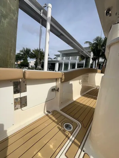 Outnumbered Yacht Photos Pics 2020 Scout 277LXF boat deck with tan accents and modern design.